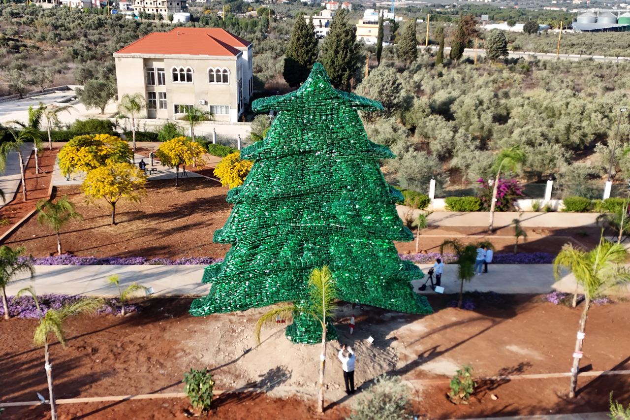 Caroline Chabtini Enters Guinness World Records with the Largest Plastic Cedar Tree on the Planet
